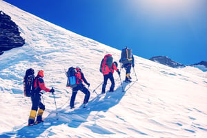 4 Bergbeklimmers op besneeuwde top